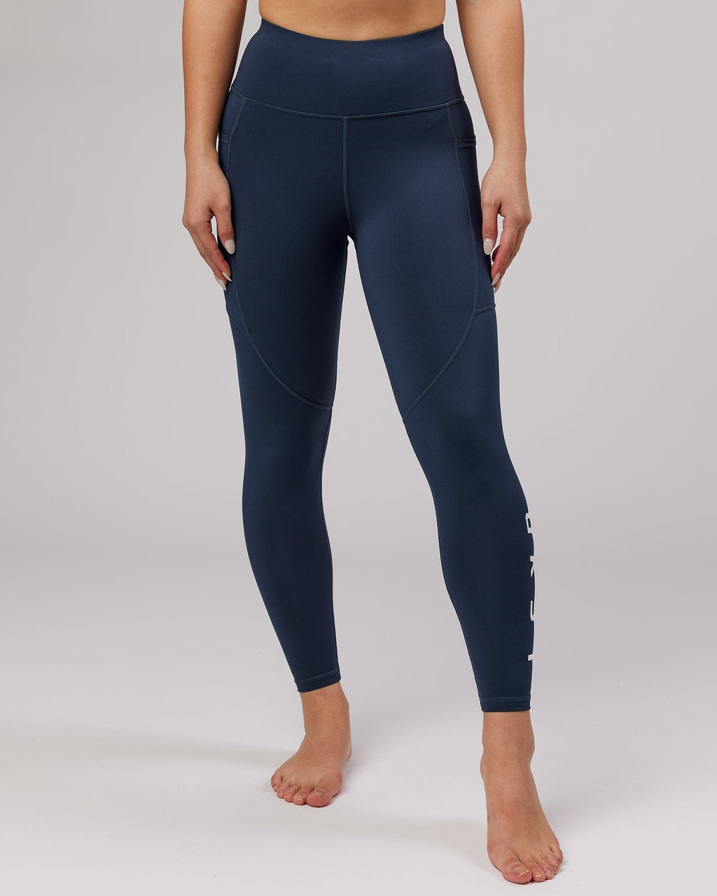 Model wearing Rep Full Length Tight - Navy