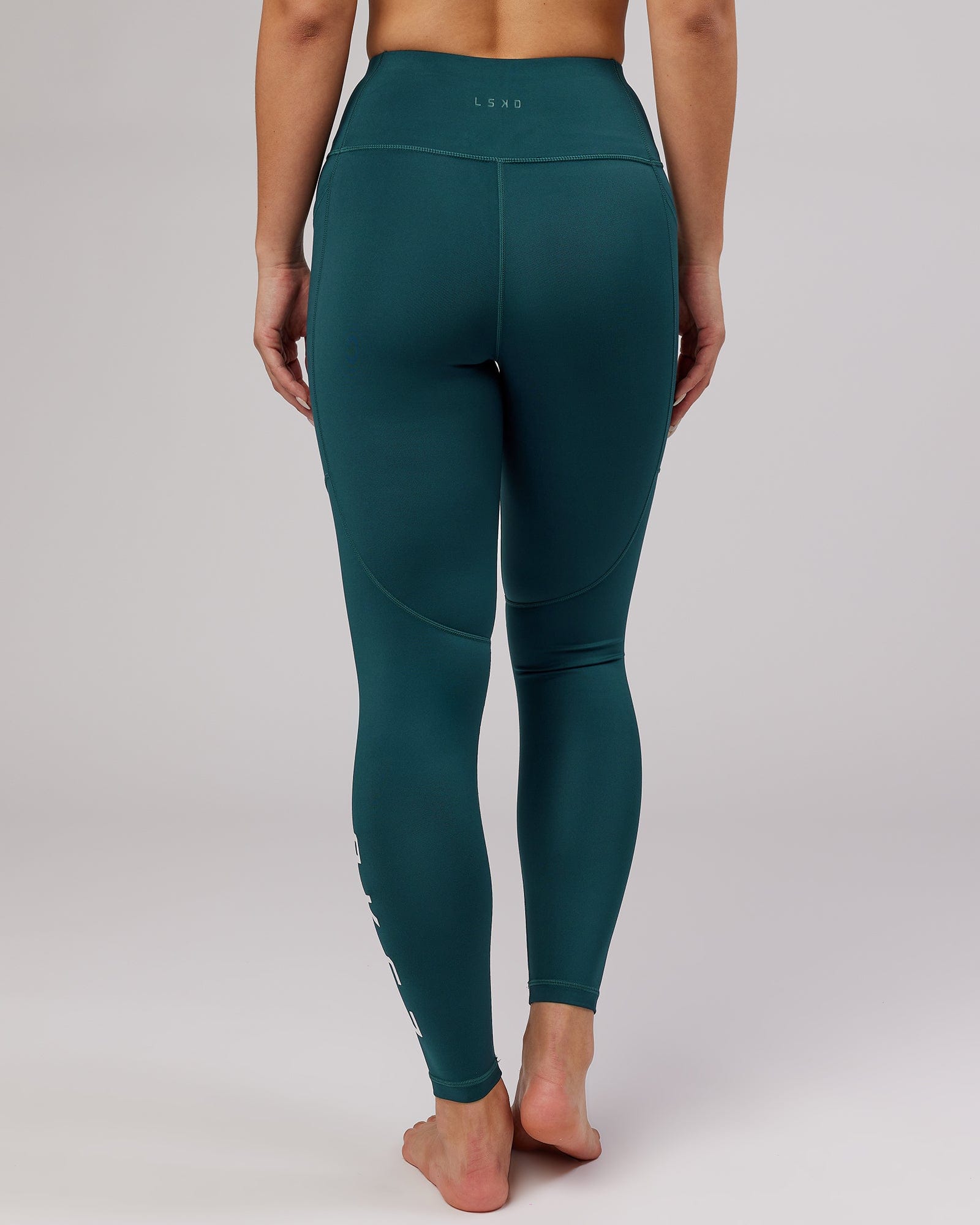 Model wearing Rep Full Length Tight - Deep Teal