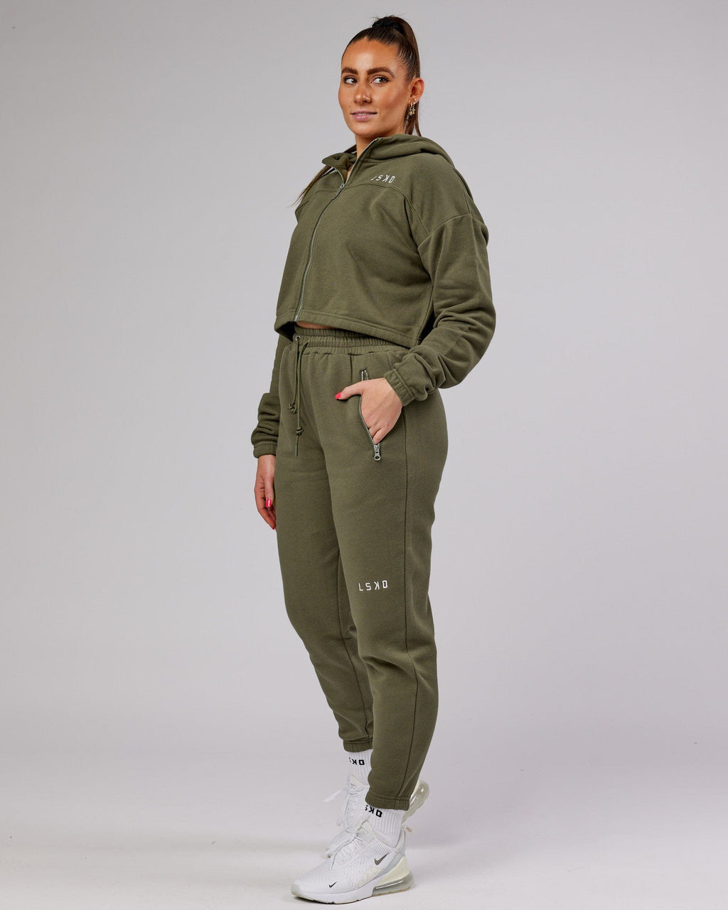 Model wearing Bridge Zip Through Hoodie - Olive Fade