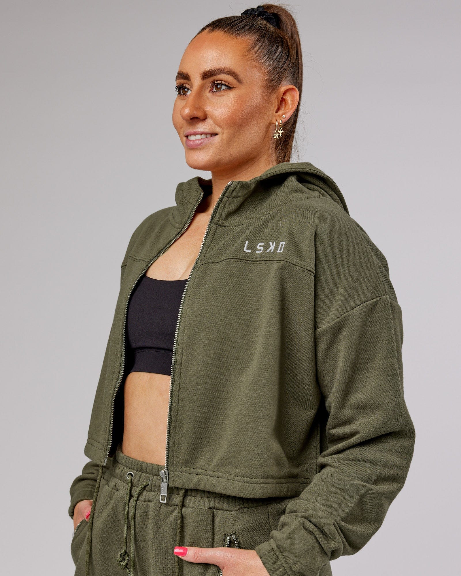 Model wearing Bridge Zip Through Hoodie - Olive Fade