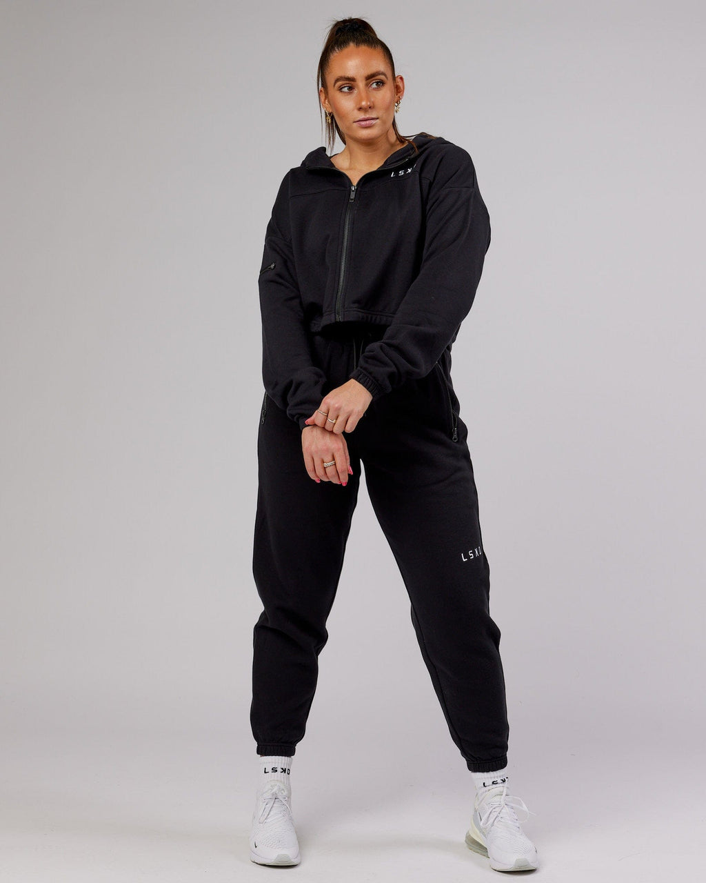 Model wearing Bridge Zip Through Hoodie - Black