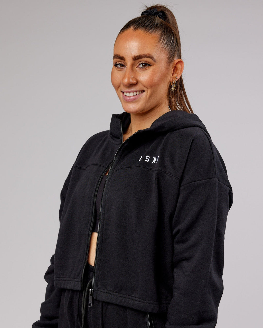 Model wearing Bridge Zip Through Hoodie - Black