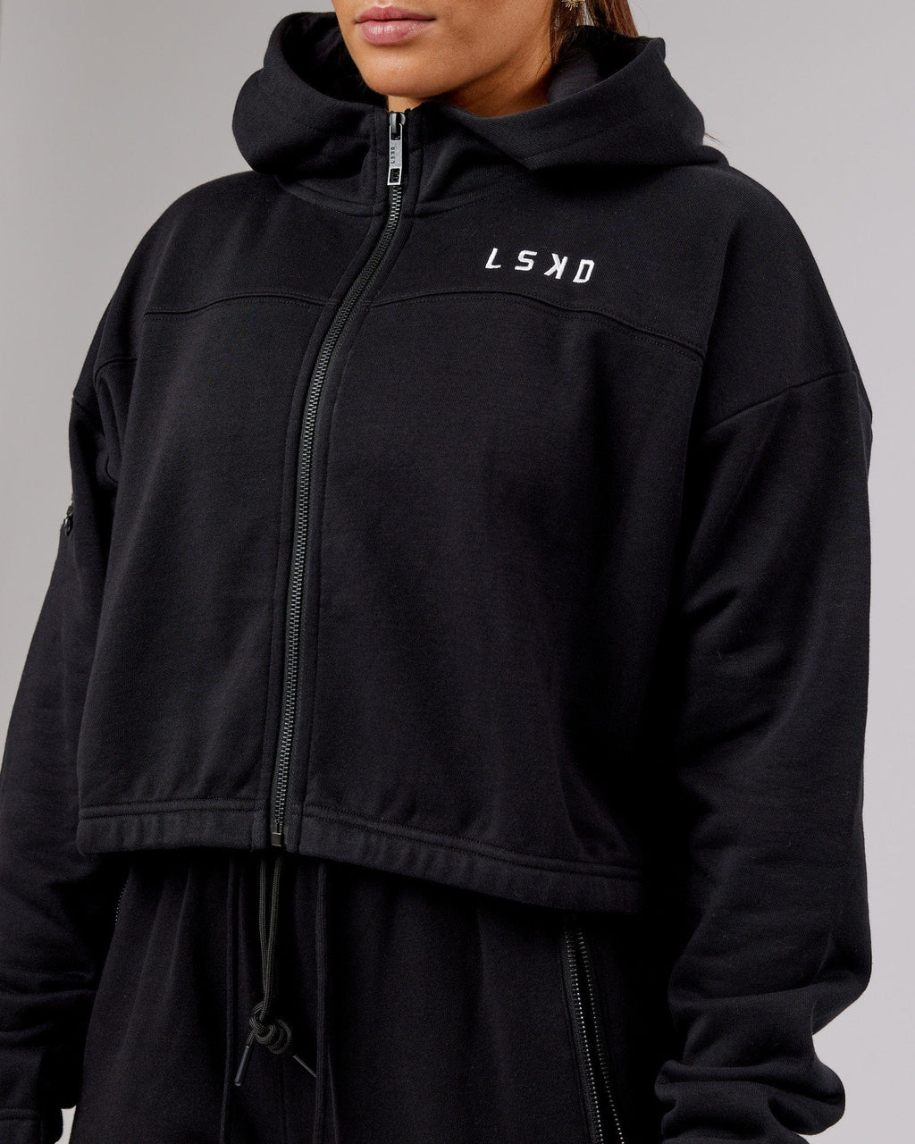 Model wearing Bridge Zip Through Hoodie - Black