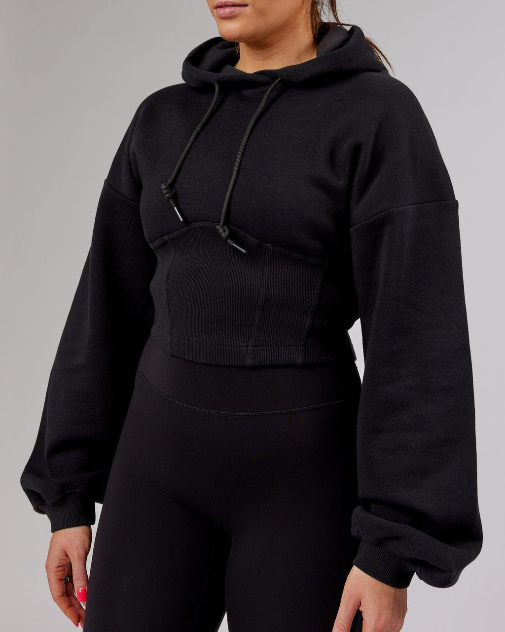 Model wearing Becca Corset Hoodie - Black
