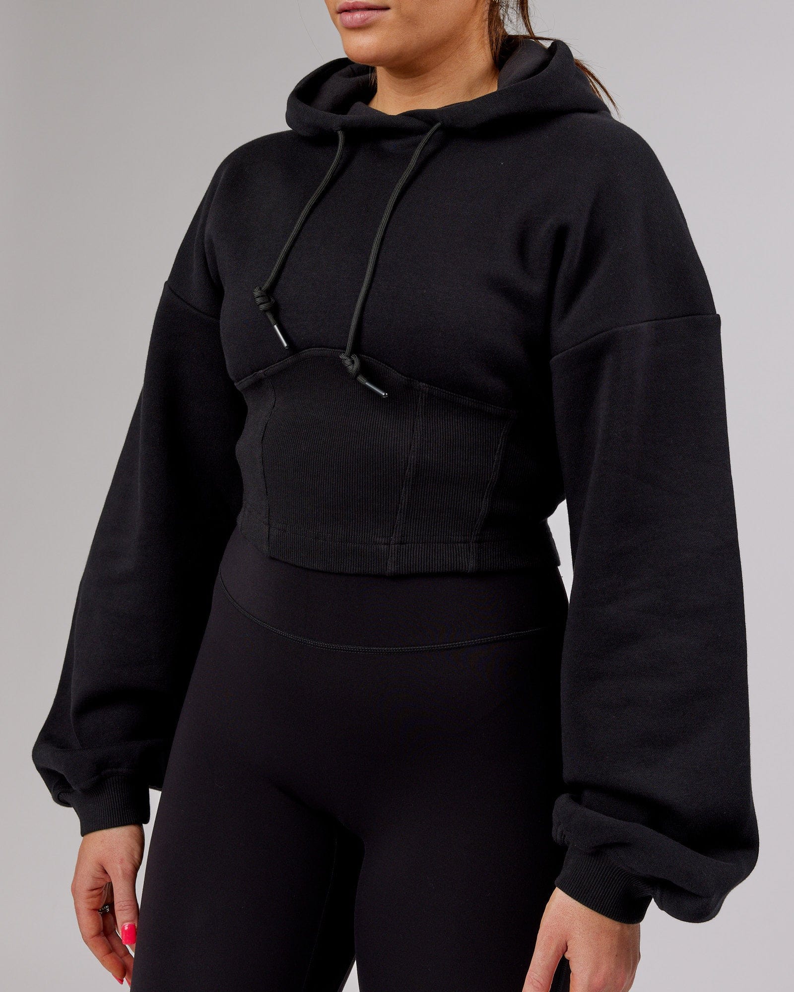 Model wearing Becca Corset Hoodie - Black