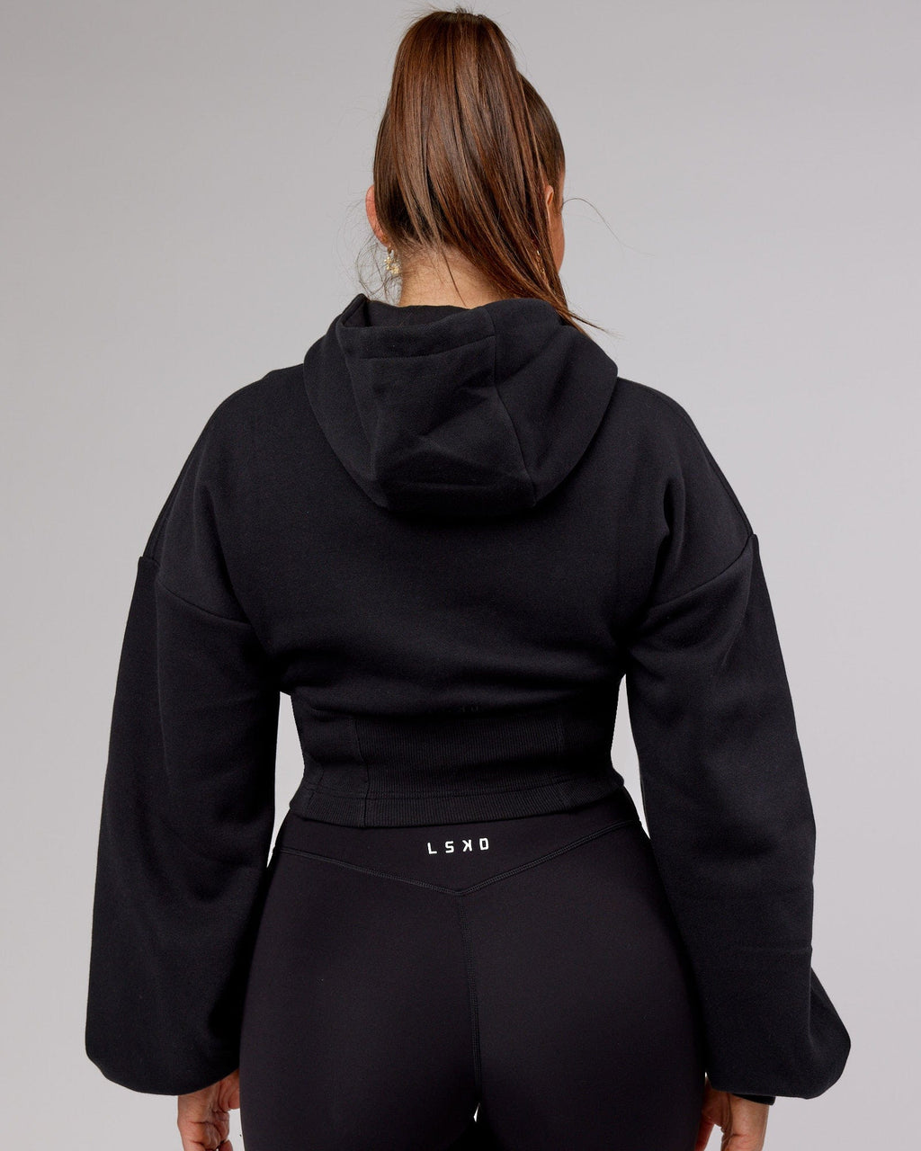 Model wearing Becca Corset Hoodie - Black