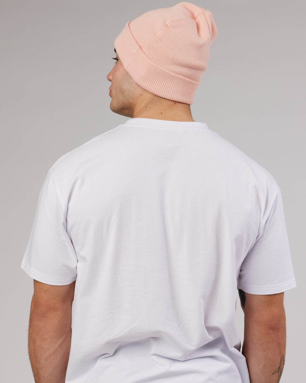 Model wearing Cornerstone Beanie - Pink-White