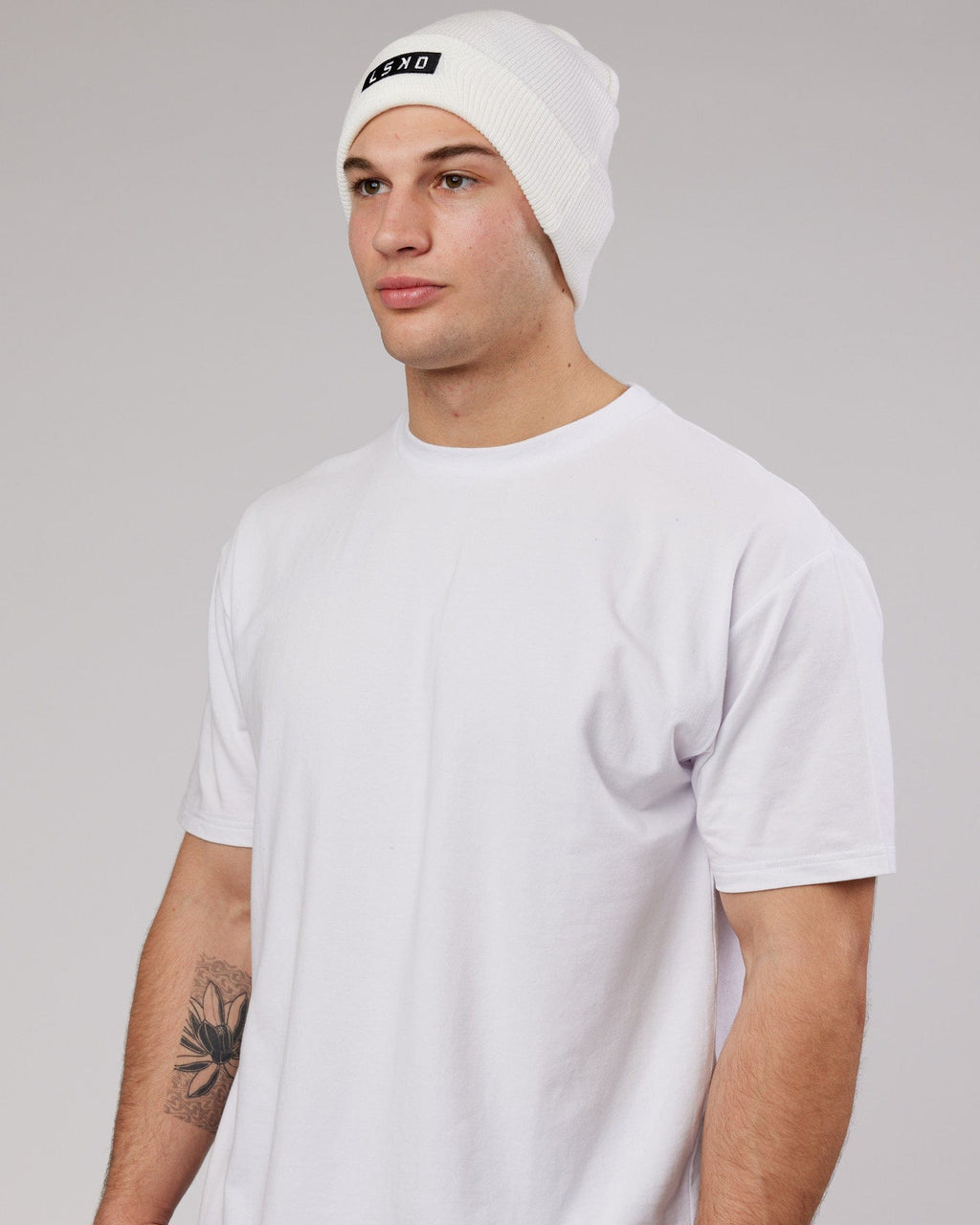 Model wearing Cornerstone Beanie - White
