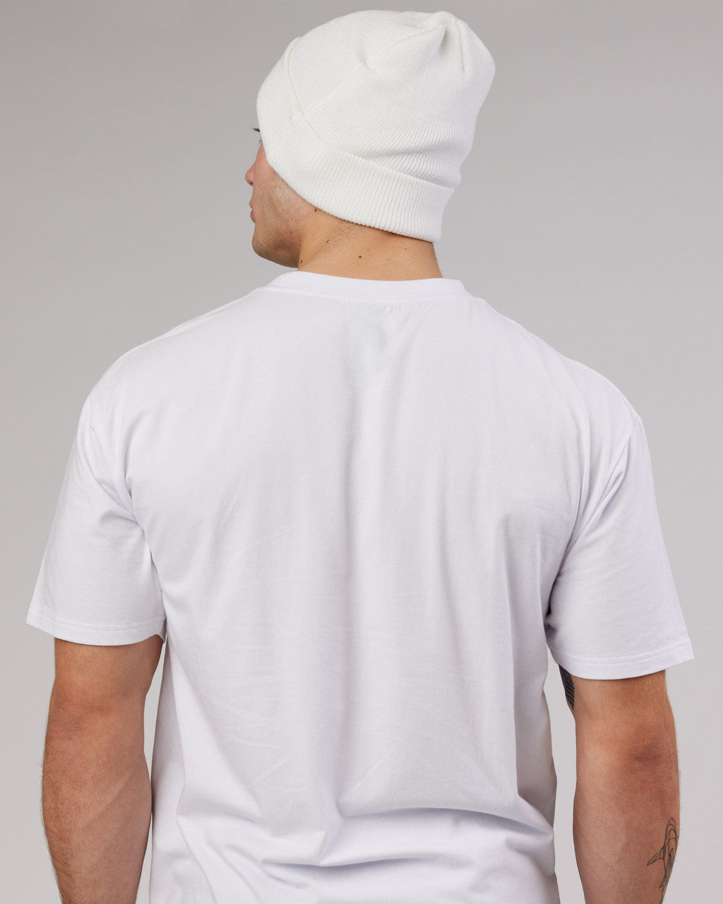 Model wearing Cornerstone Beanie - White