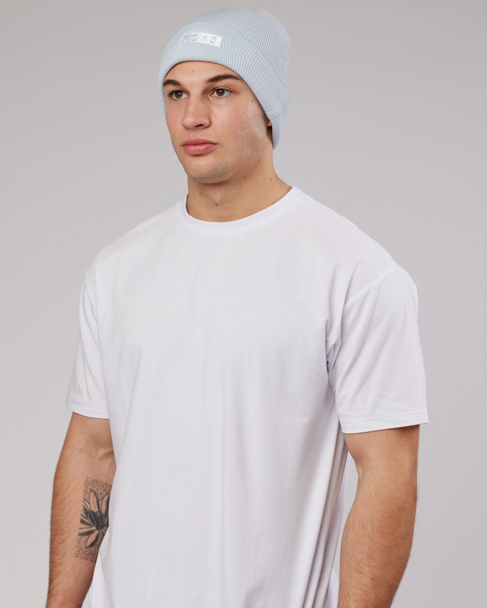 Model wearing Cornerstone Beanie - Ballad Blue