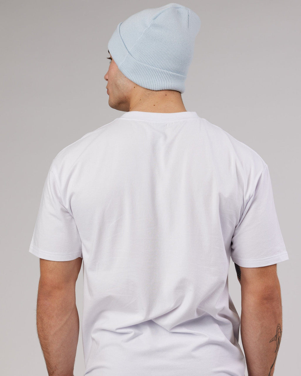 Model wearing Cornerstone Beanie - Ballad Blue