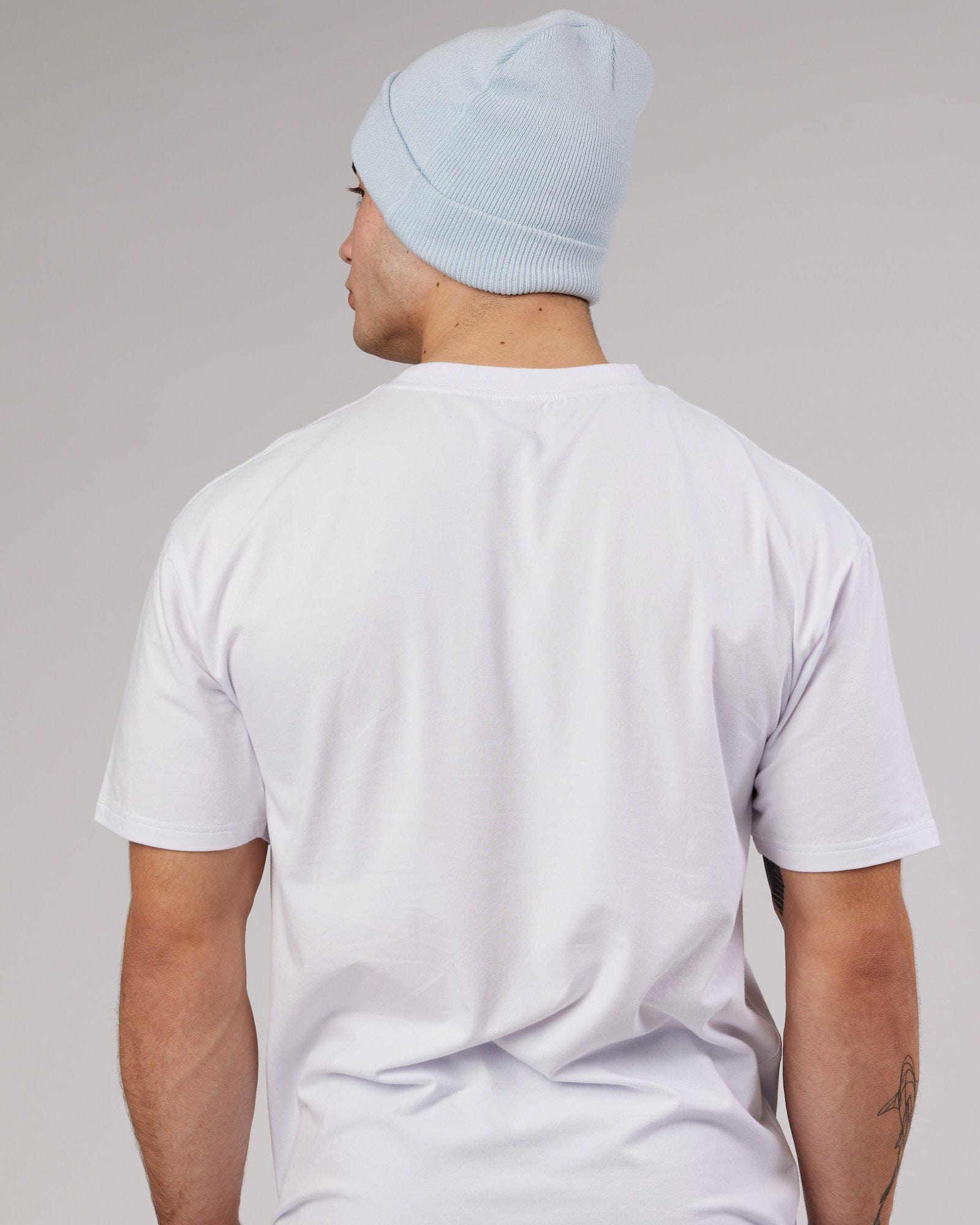 Model wearing Cornerstone Beanie - Ballad Blue