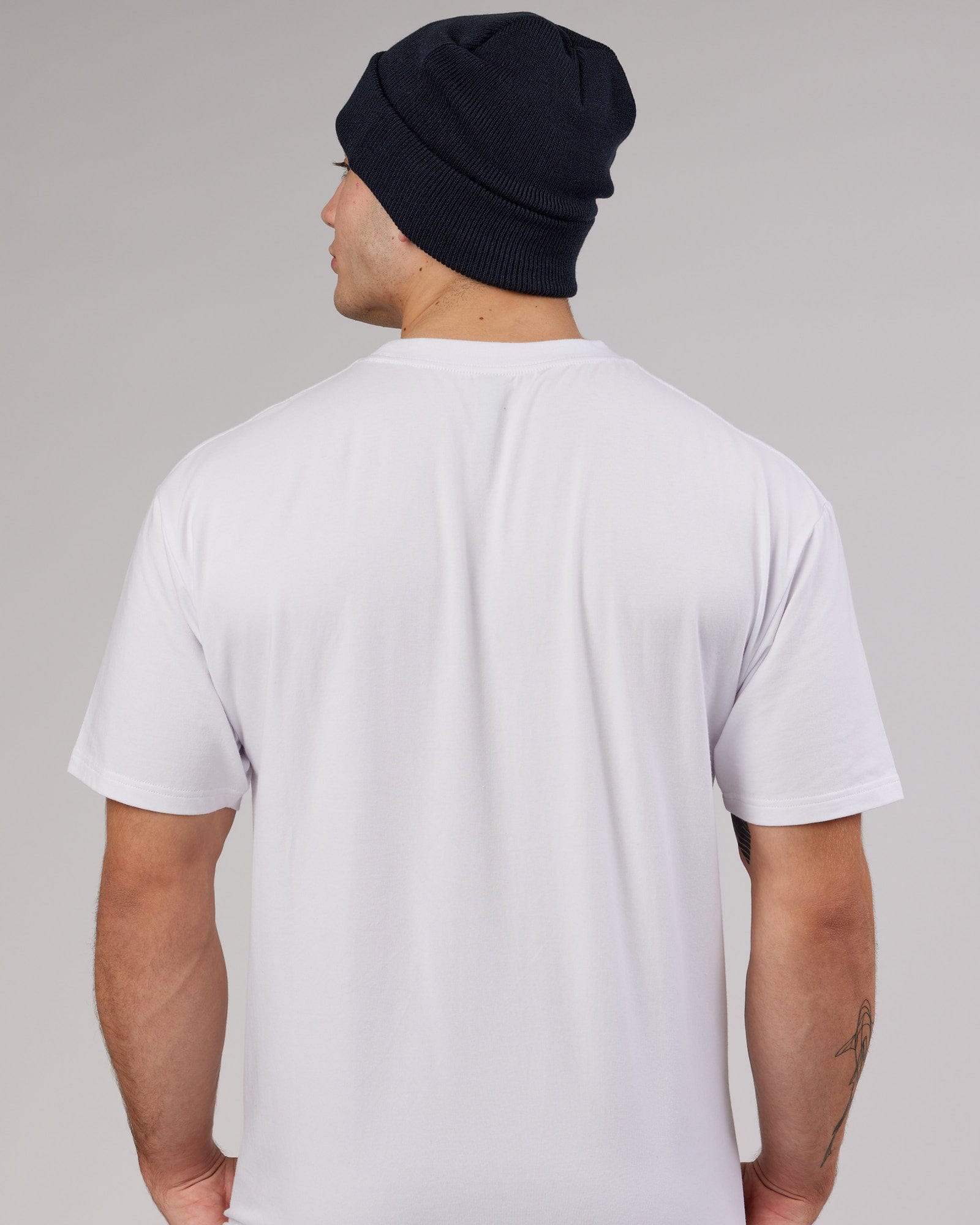 Model wearing Cornerstone Beanie - Carbon