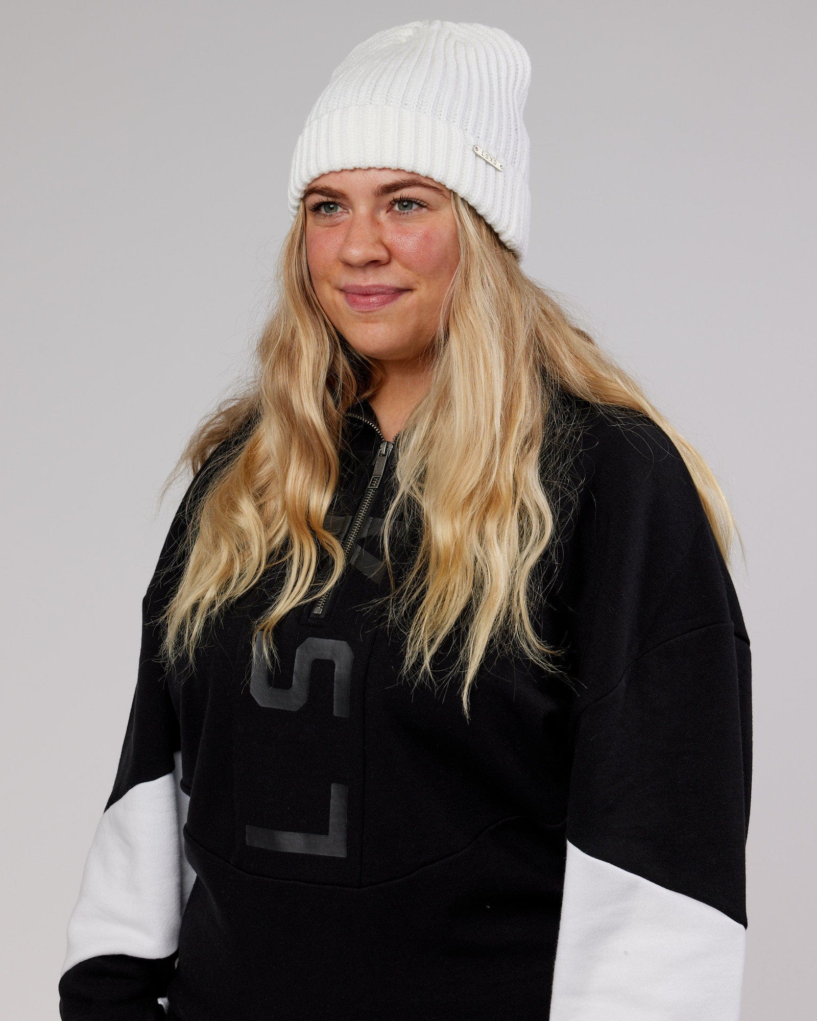 Model wearing Alpine Beanie - White