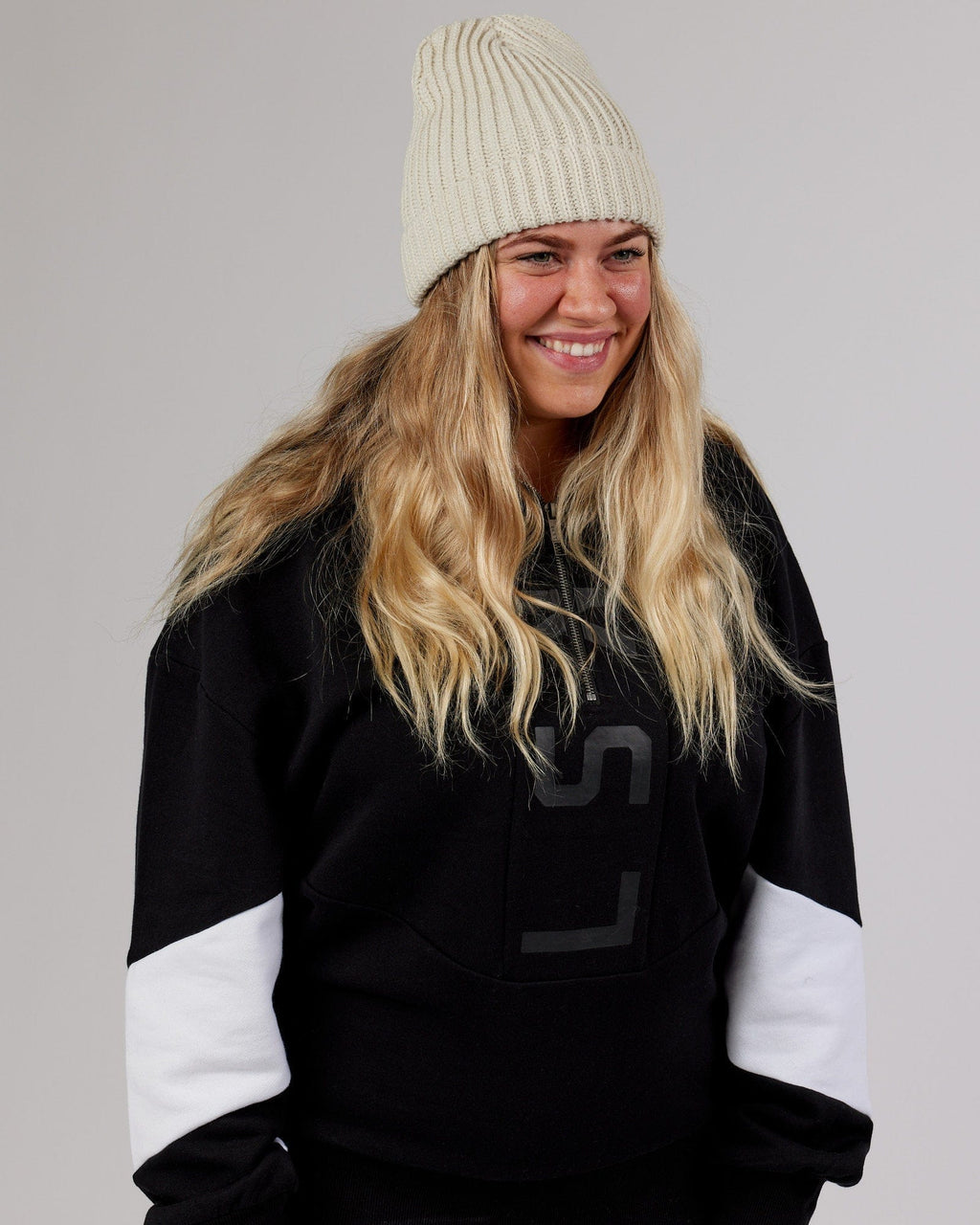 Model wearing Alpine Beanie - Bone