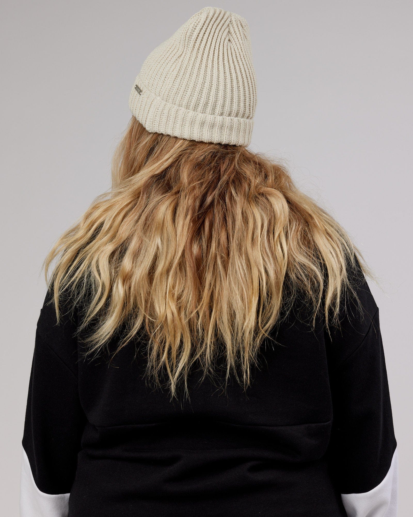 Model wearing Alpine Beanie - Bone