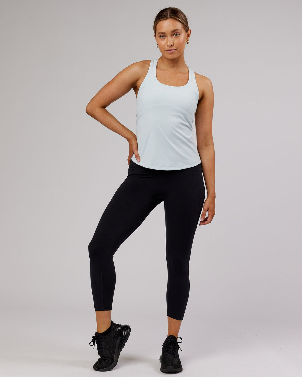Model wearing Lift Performance Tank - Ballad Blue