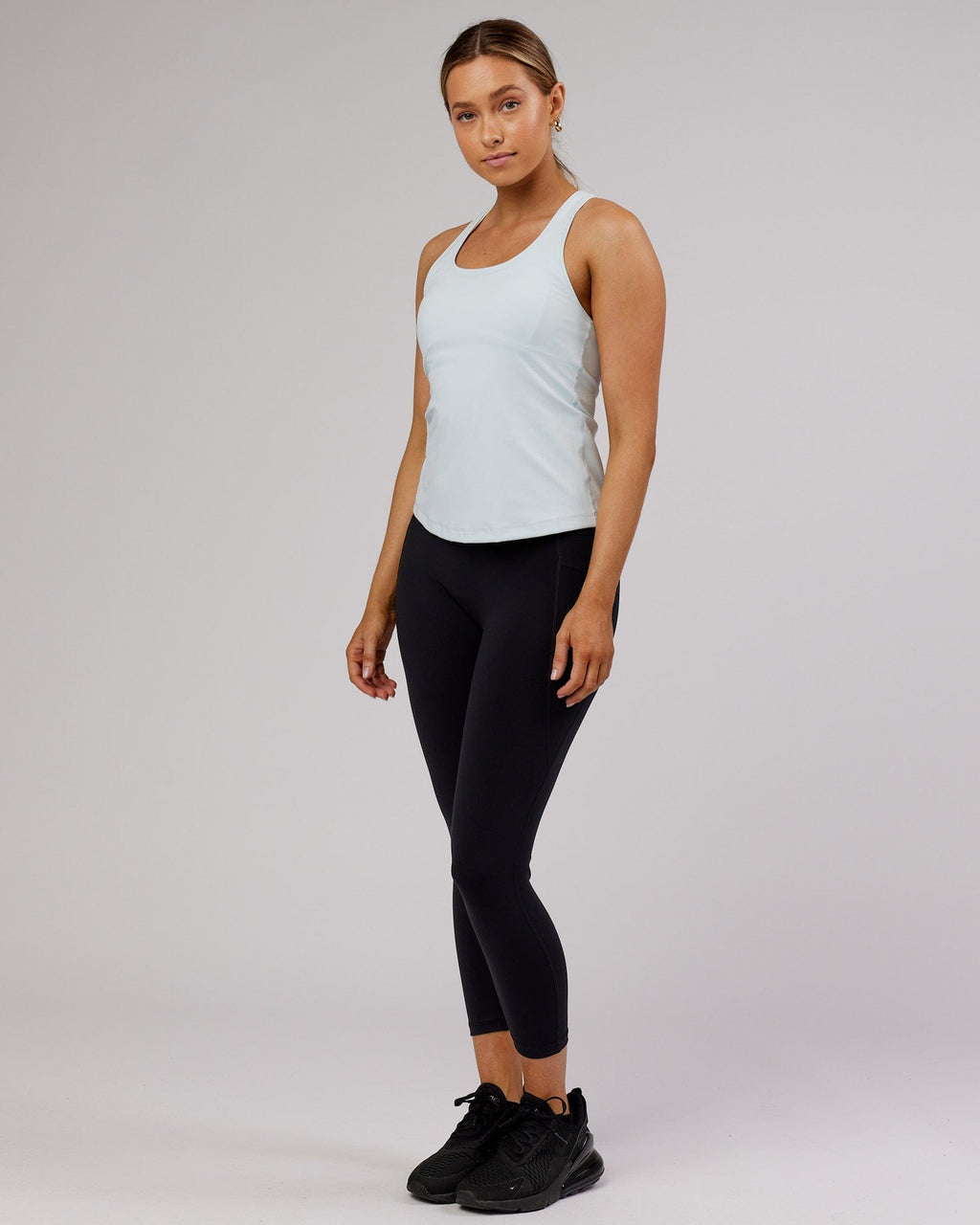 Model wearing Lift Performance Tank - Ballad Blue