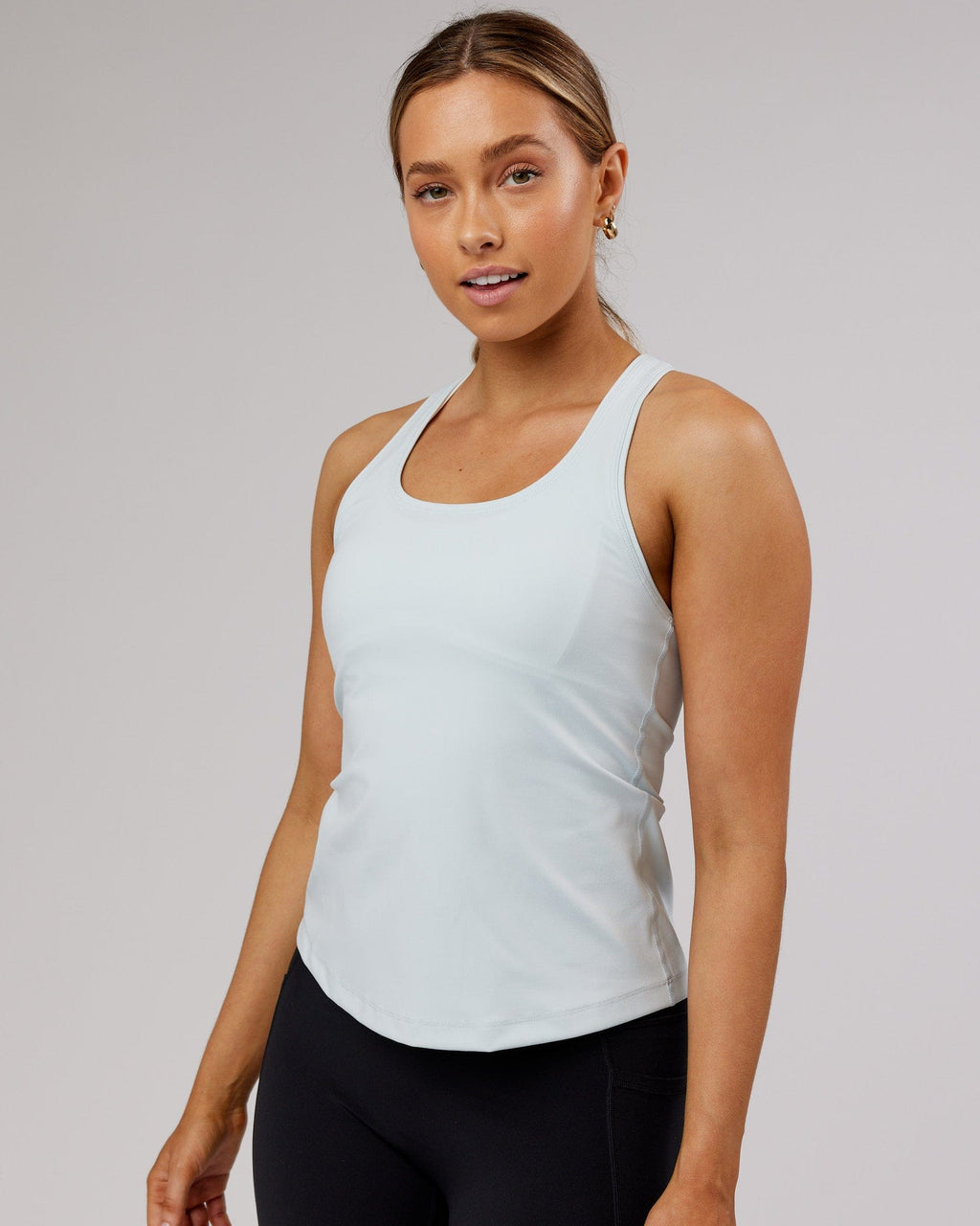 Model wearing Lift Performance Tank - Ballad Blue