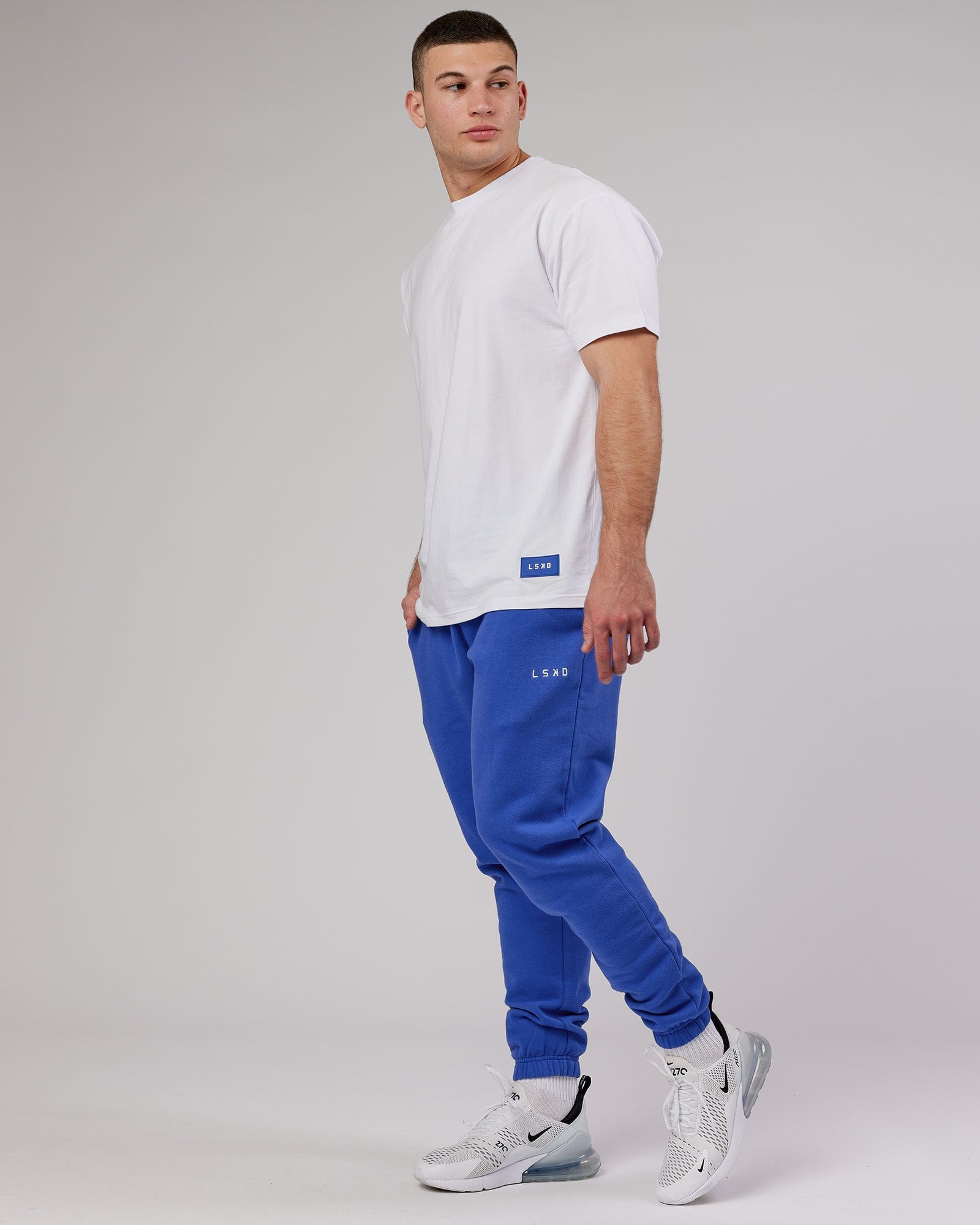 Model wearing Ready Track Pant - Power Cobalt