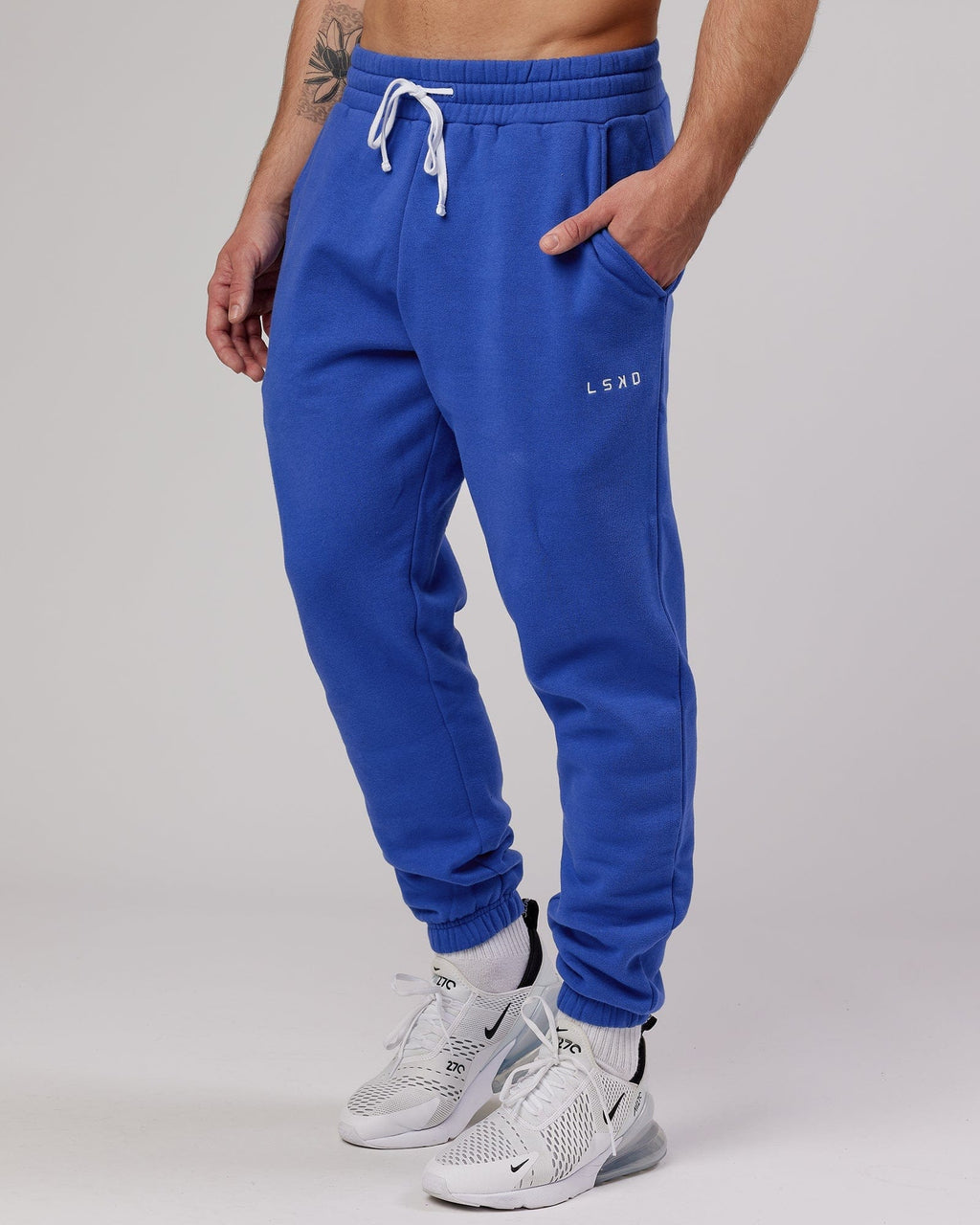 Model wearing Ready Track Pant - Power Cobalt