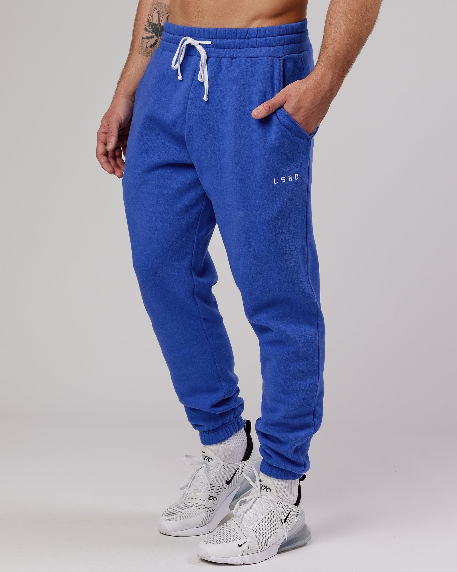 Model wearing Ready Track Pant - Power Cobalt