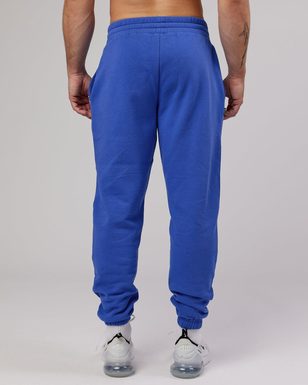 Model wearing Ready Track Pant - Power Cobalt