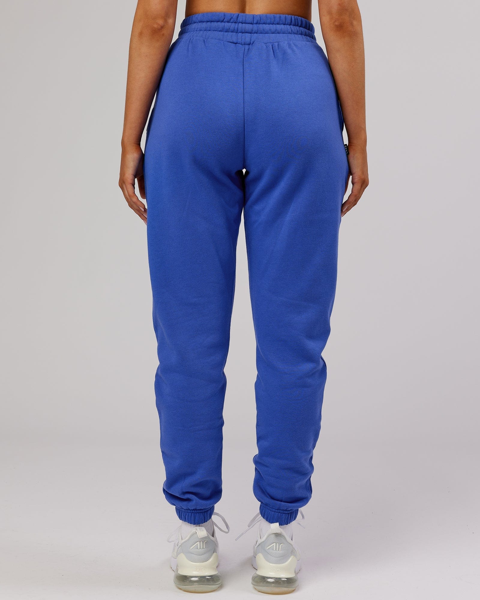 Model wearing Unisex Ready Track Pant - Power Cobalt