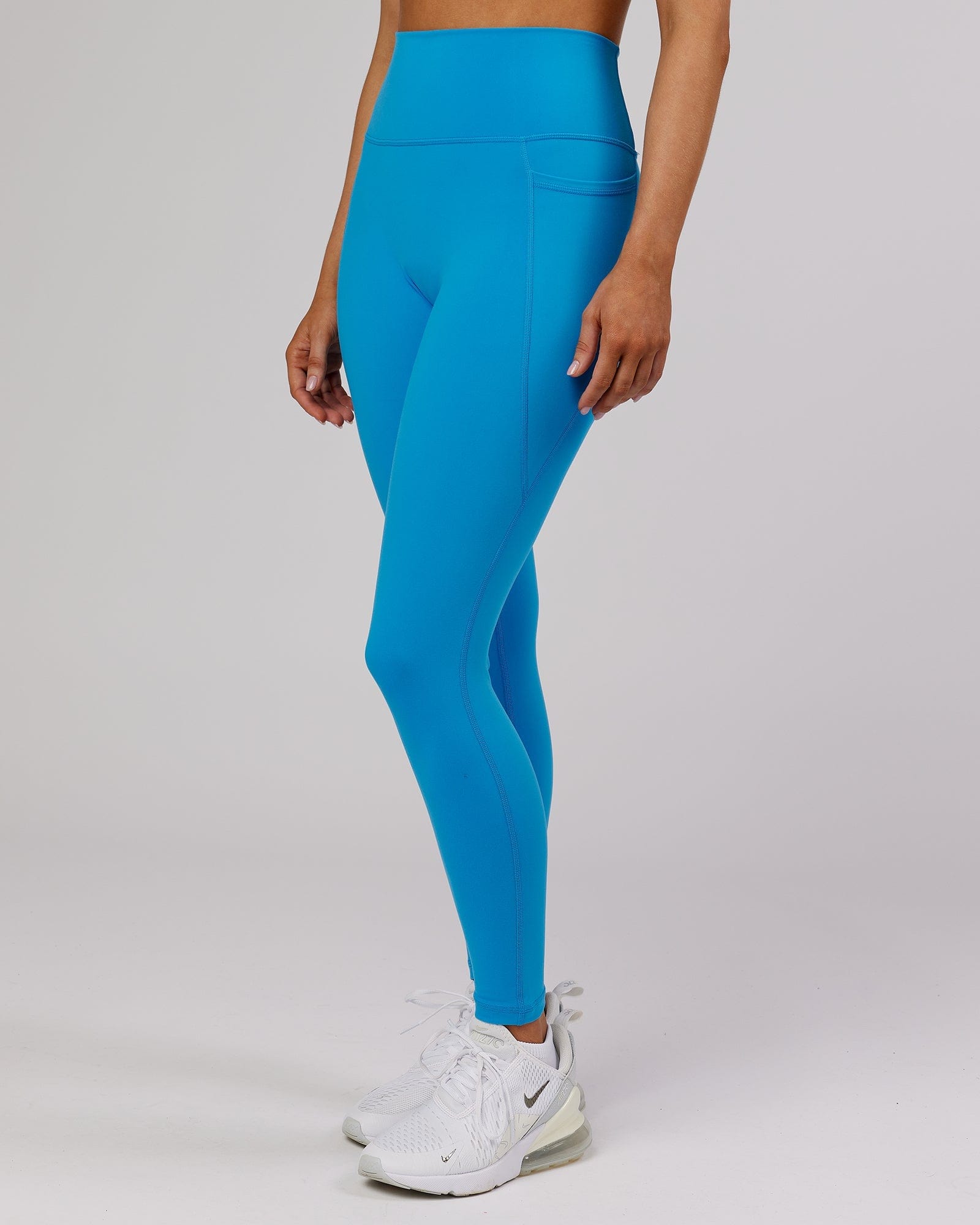 Model wearing Fusion Full Length Tight - Ibiza Blue