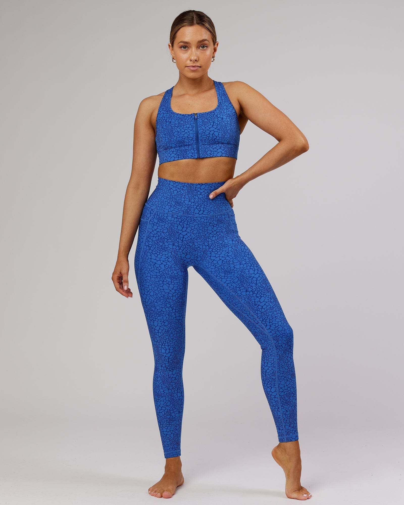 Model wearing Fusion Full Length Tight - Ocean Scale