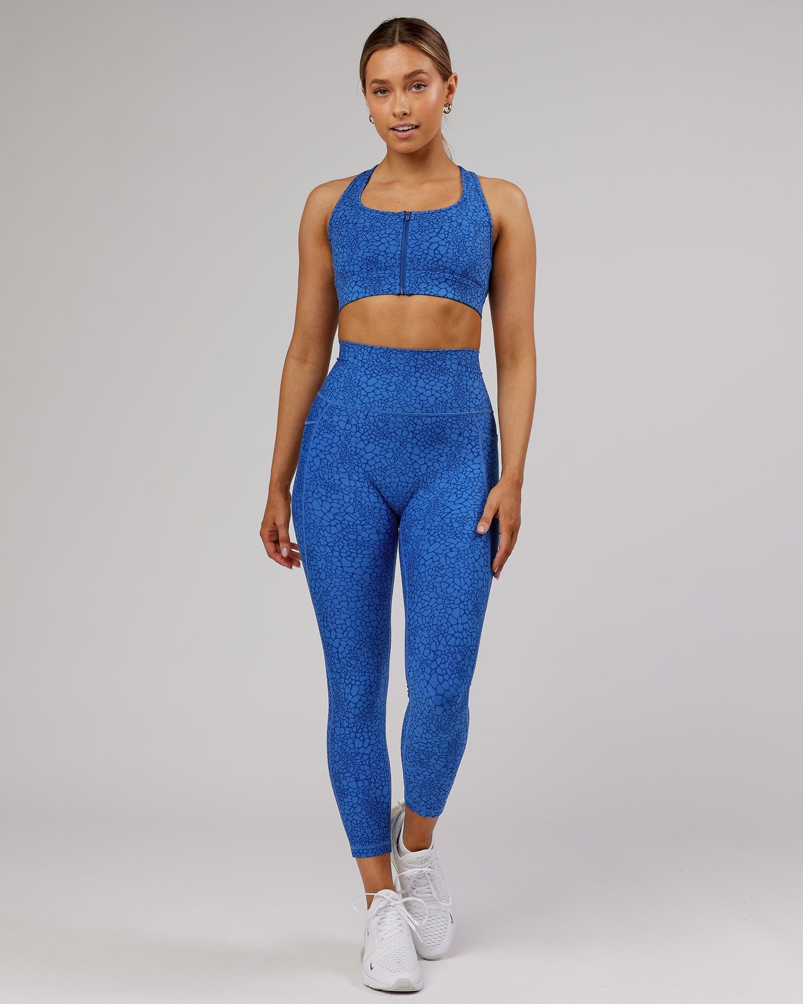 Model wearing Fusion 7/8 Length Tight - Ocean Scale