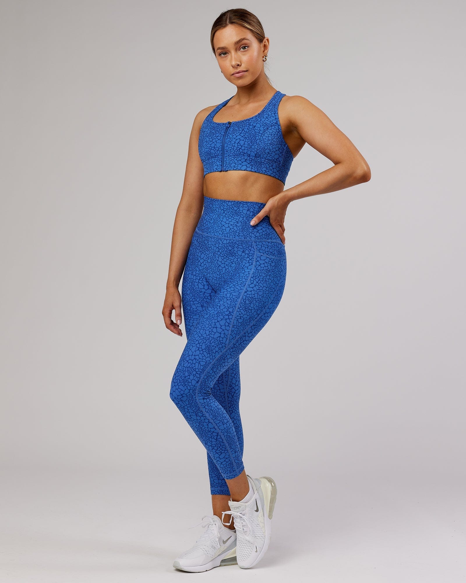 Model wearing Fusion 7/8 Length Tight - Ocean Scale