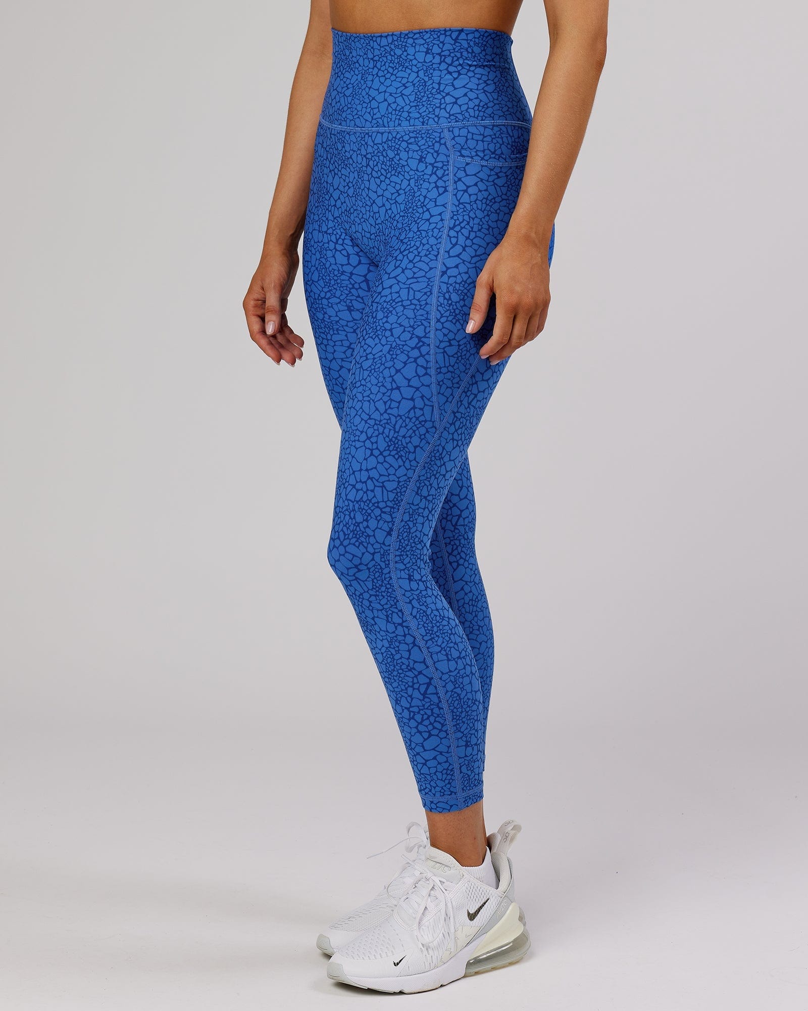 Model wearing Fusion 7/8 Length Tight - Ocean Scale