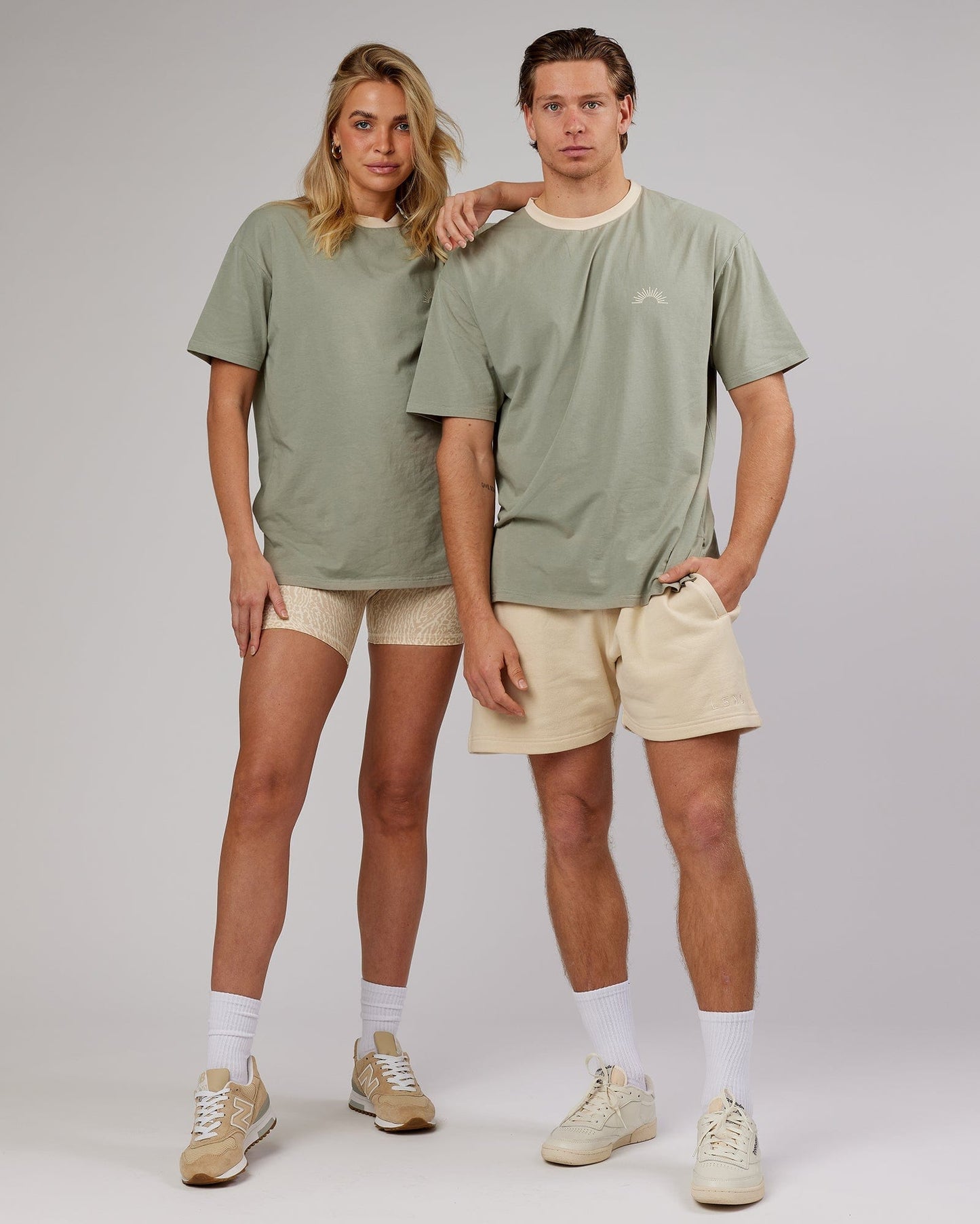 Model wearing Unisex Rise FLXCotton Oversize Tee - Sage