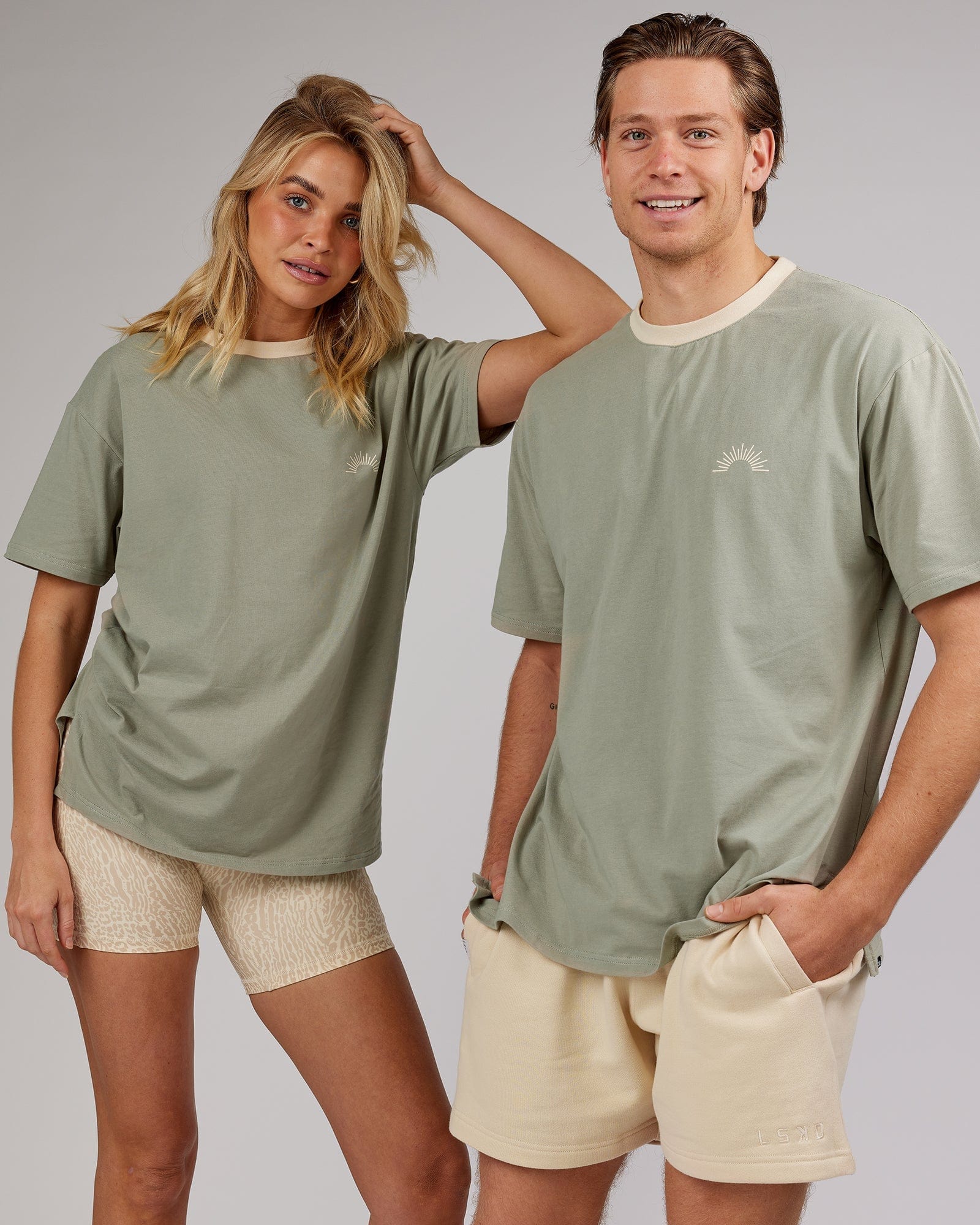 Model wearing Unisex Rise FLXCotton Oversize Tee - Sage