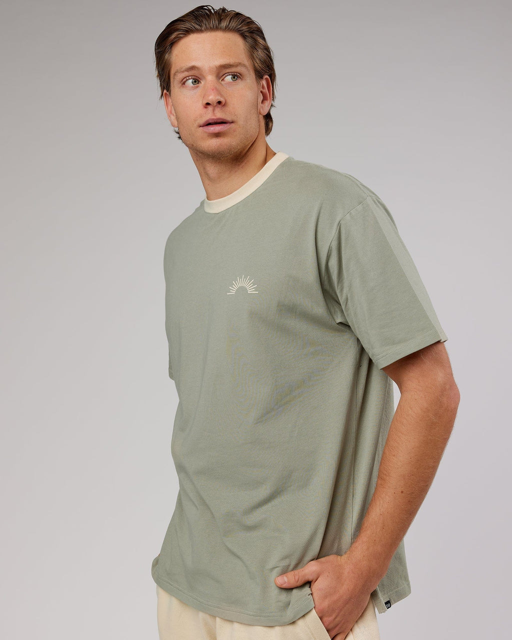 Model wearing Unisex Rise FLXCotton Oversize Tee - Sage