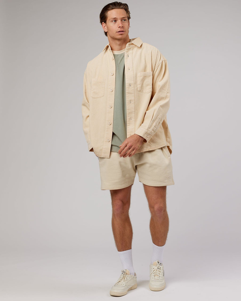 Model wearing Unisex Rise Cord Shacket - Classic Cream
