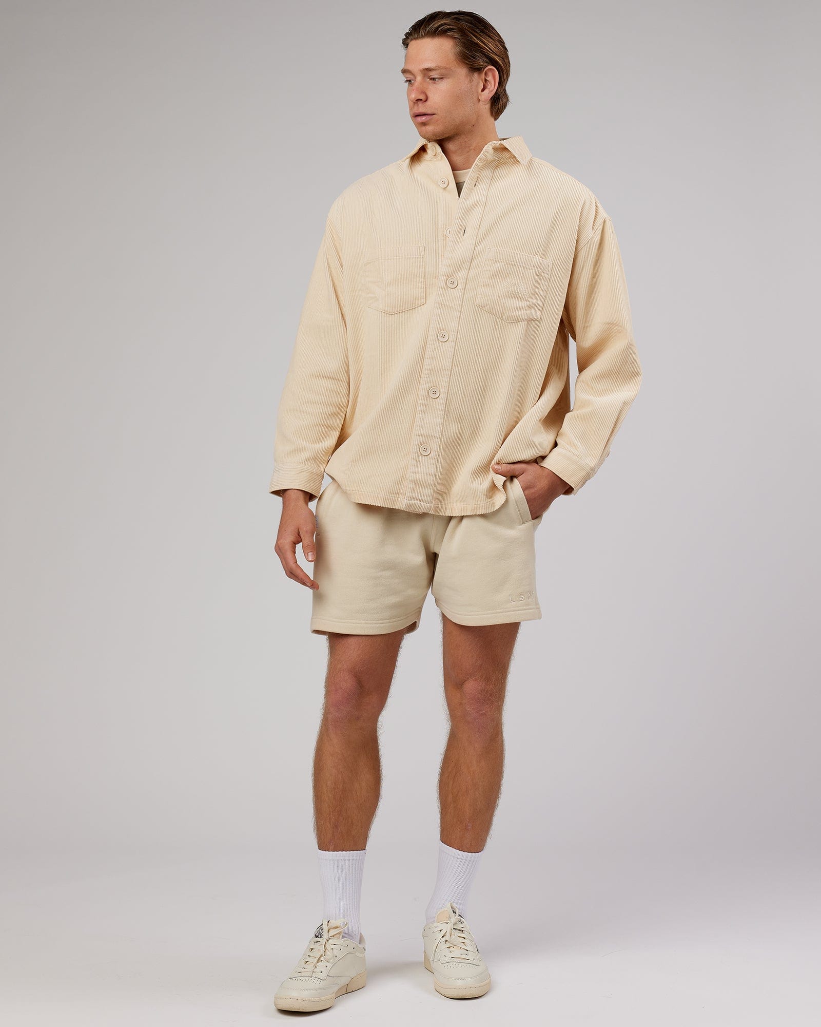 Model wearing Unisex Rise Cord Shacket - Classic Cream