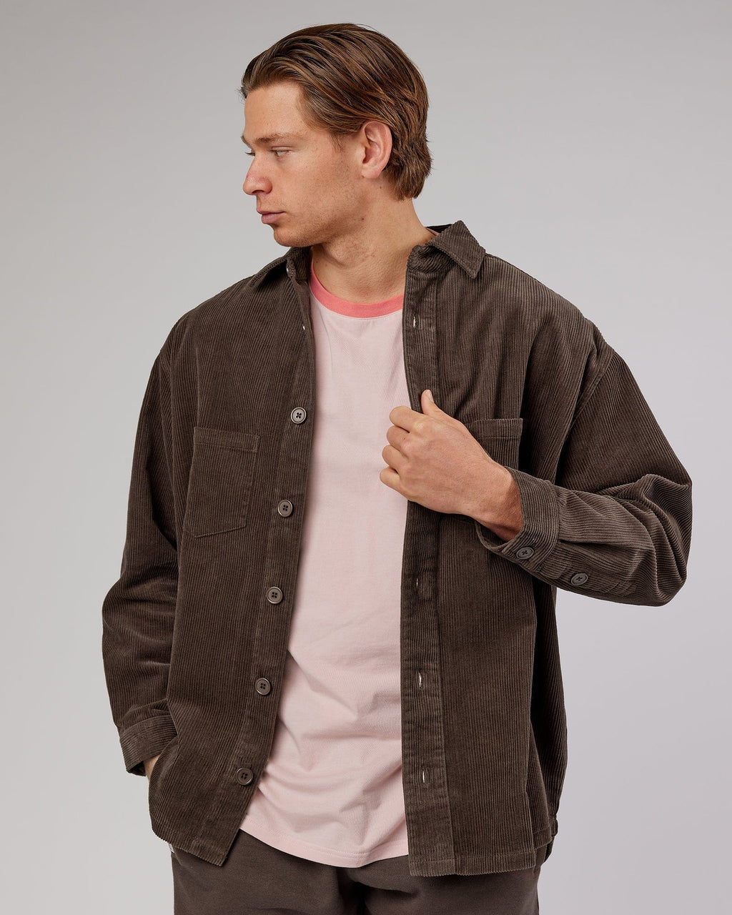 Model wearing Unisex Rise Cord Shacket - Mocha