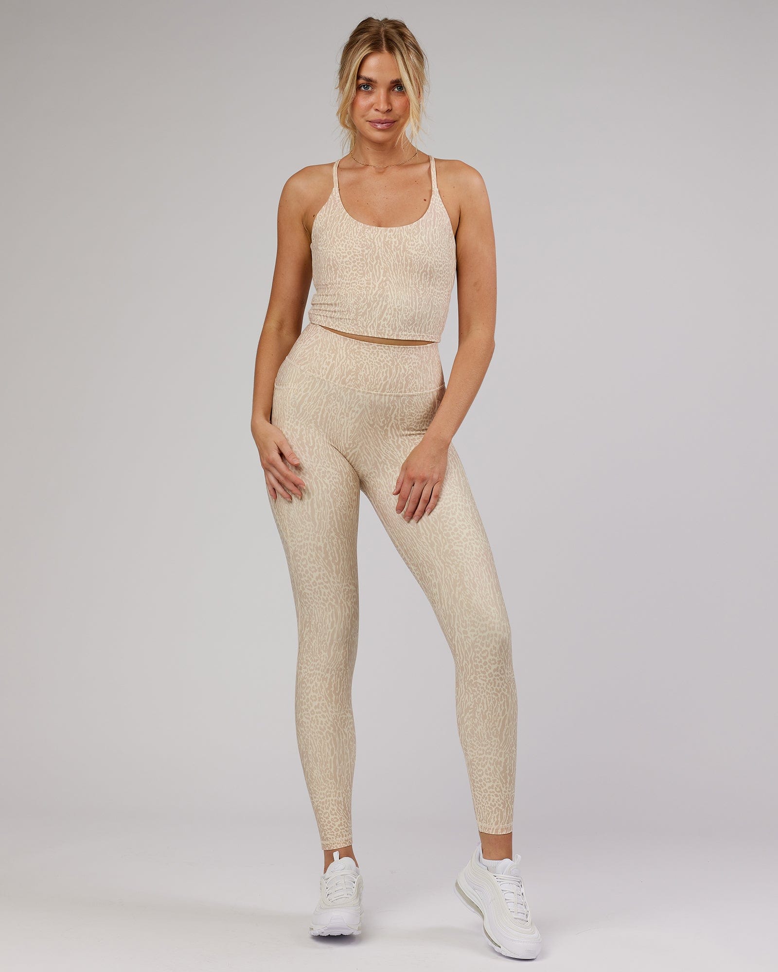 Model wearing Determined Shelf Sports Tank - Rise Print