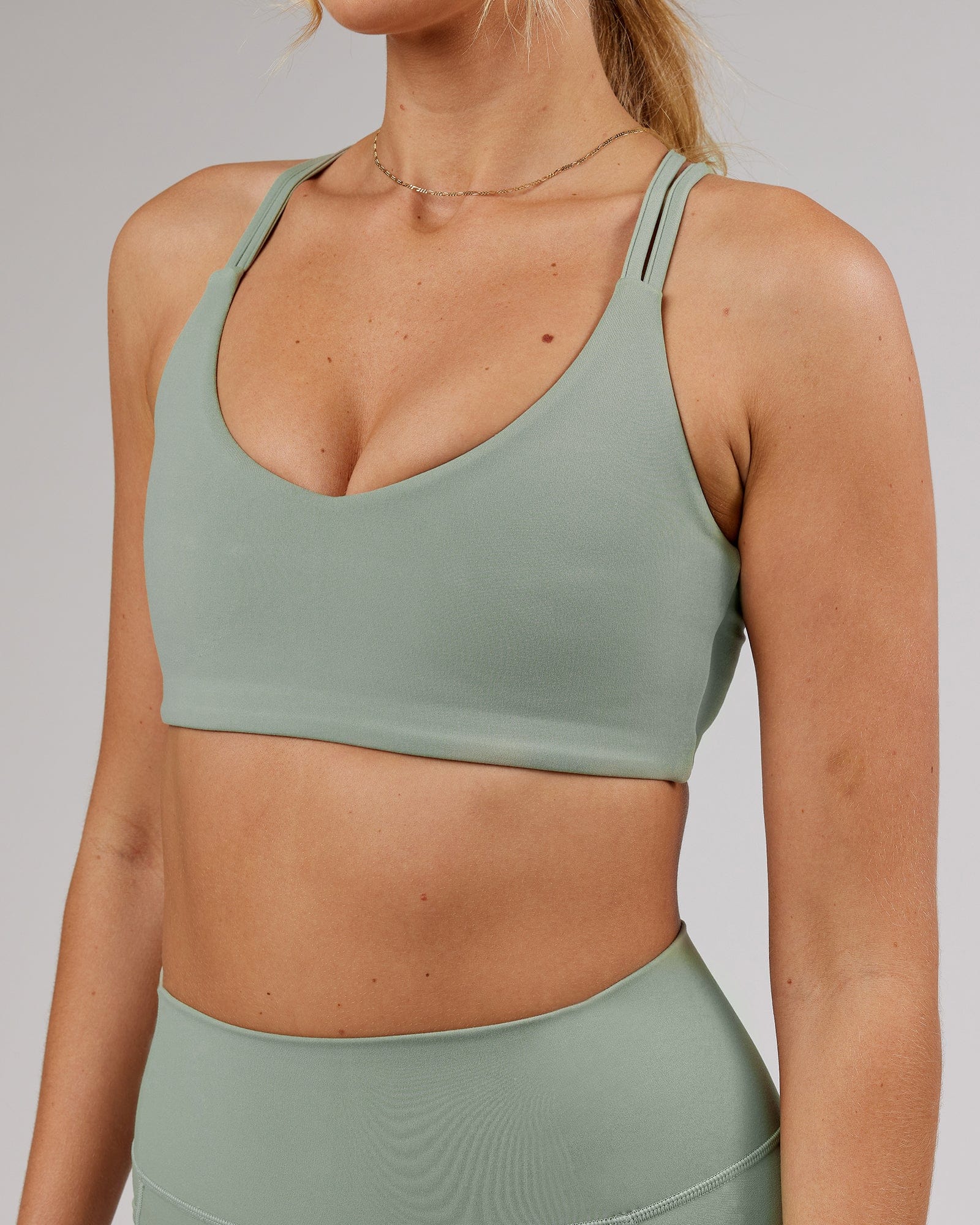 Model wearing Uplift Sports Bra - Sage