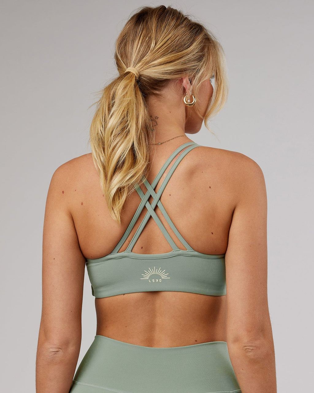 Model wearing Uplift Sports Bra - Sage