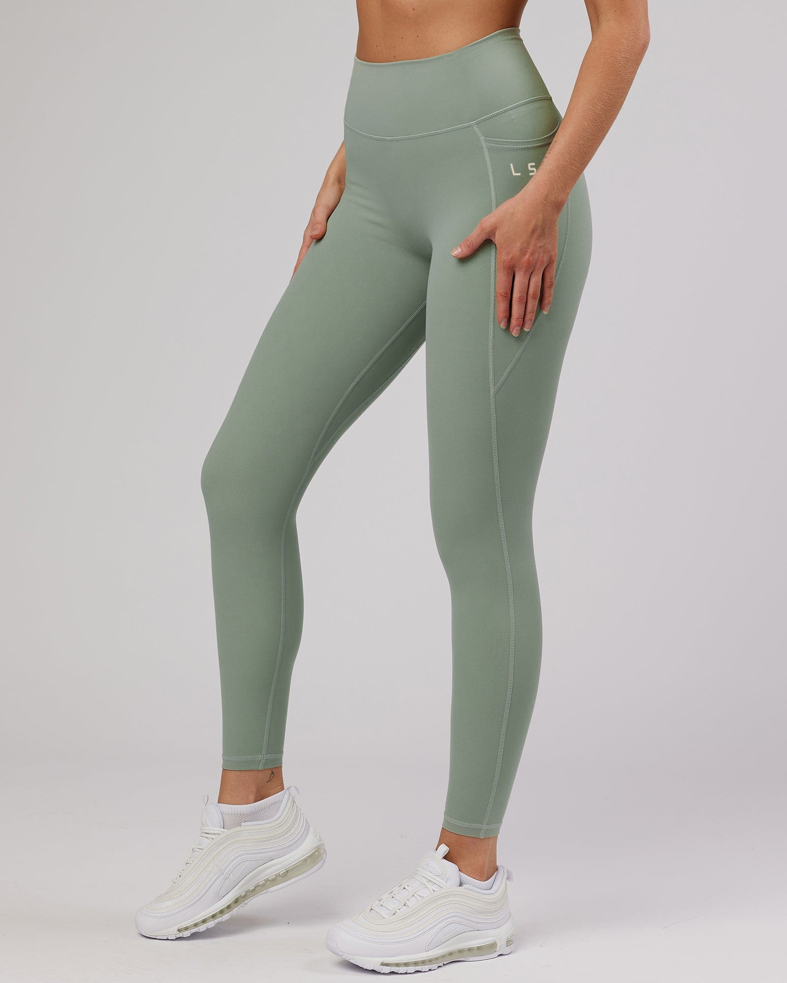 Model wearing Energise Full Length Tight - Sage