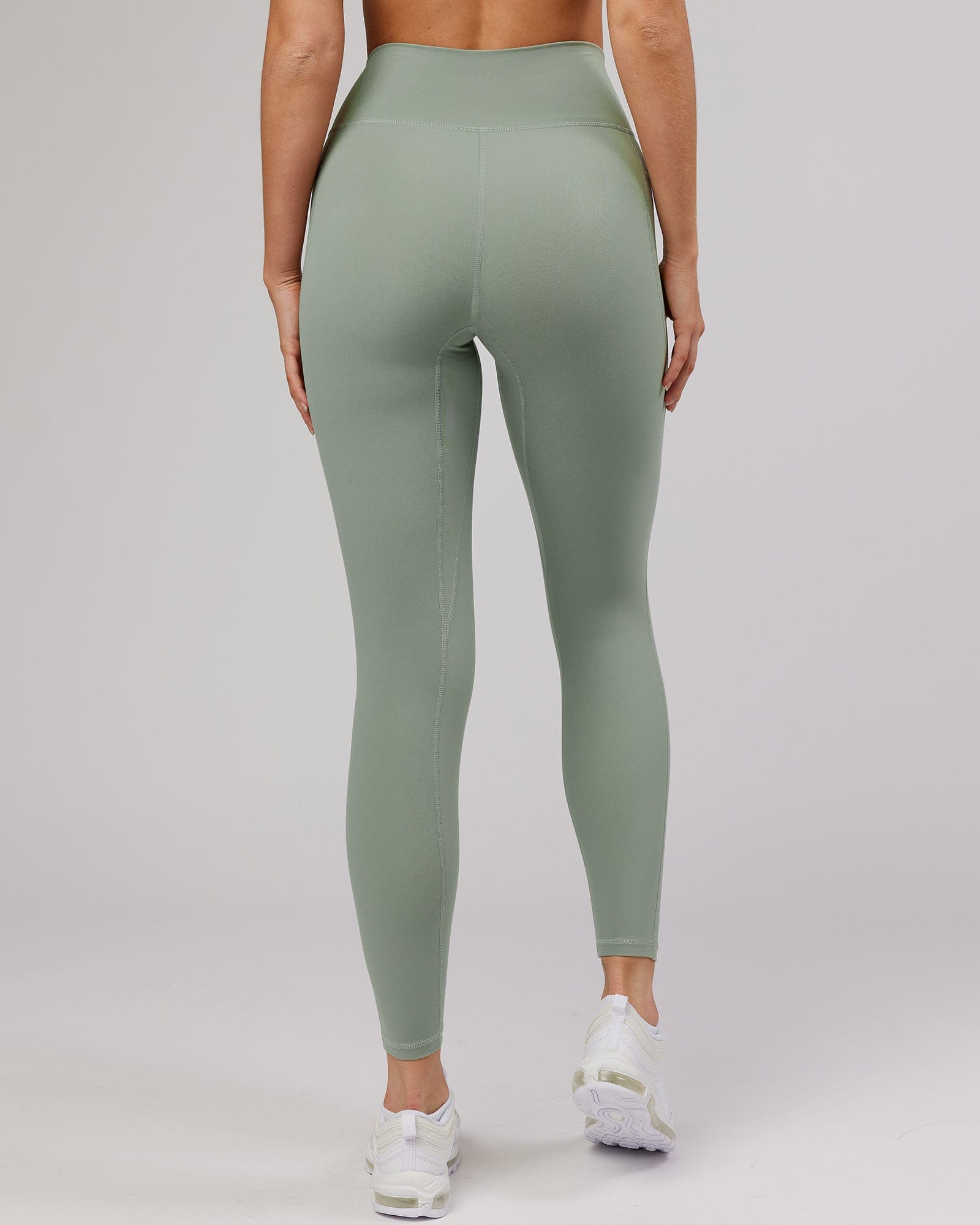 Model wearing Energise Full Length Tight - Sage