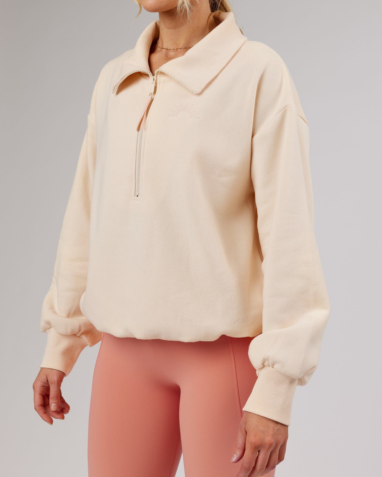 Model wearing Elevate FLXFleece 1/4 Zip Sweater - Classic Cream