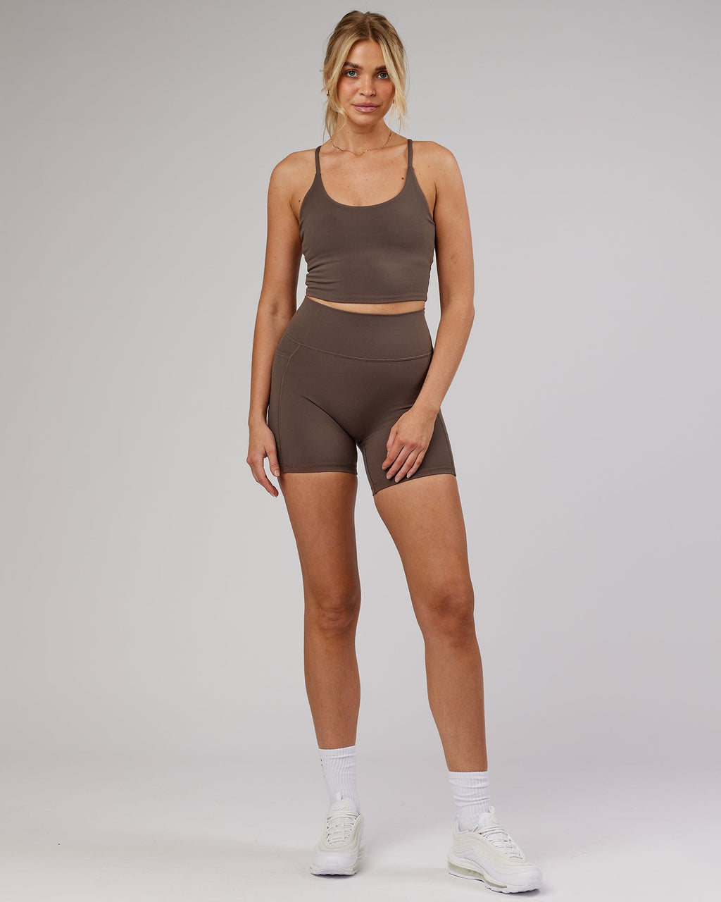 Model wearing Determined Shelf Sports Tank - Mocha