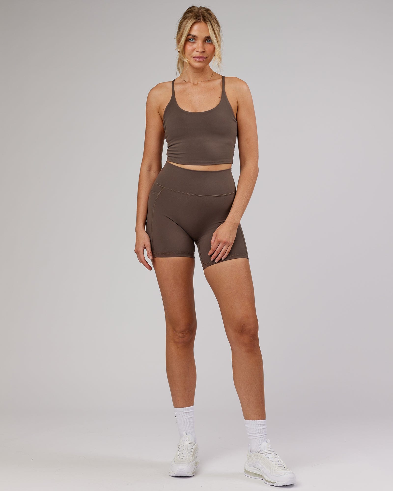 Model wearing Energise Mid Short Tight - Mocha