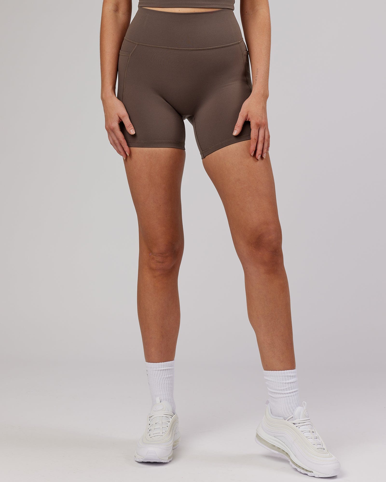 Model wearing Energise Mid Short Tight - Mocha