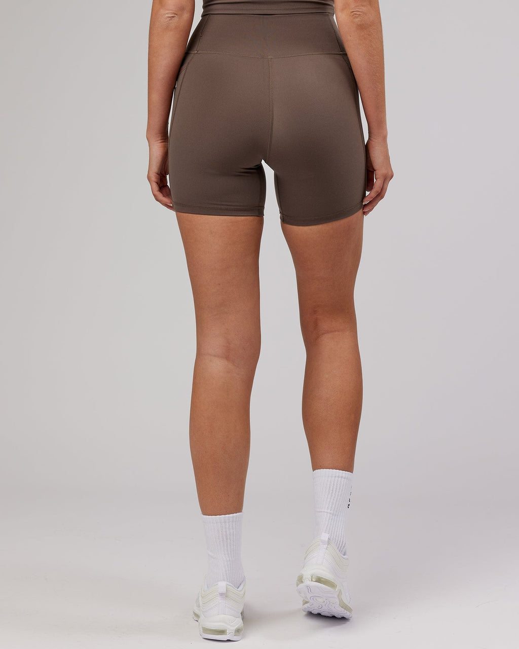 Model wearing Energise Mid Short Tight - Mocha