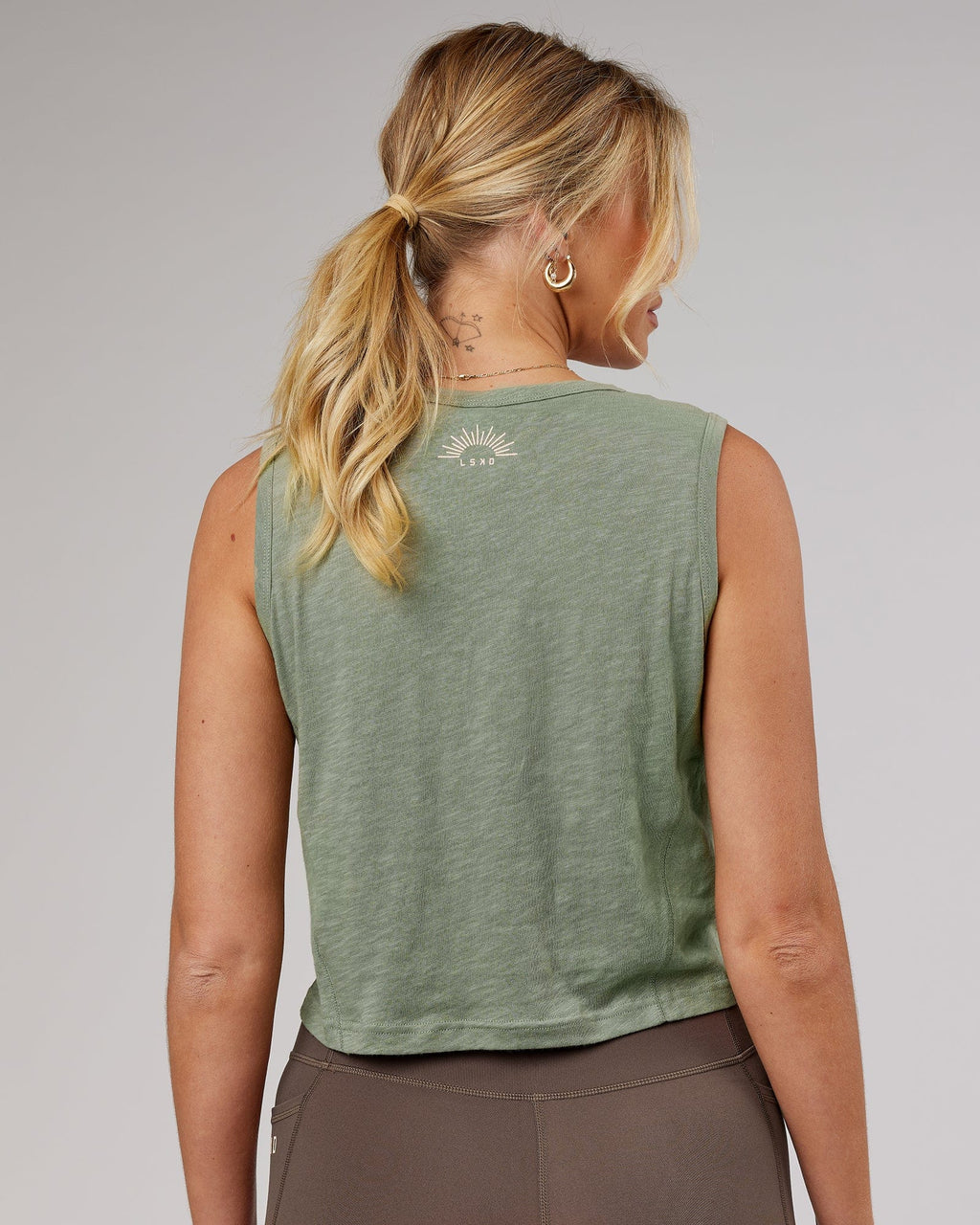 Model wearing Elevate Training Tank - Sage